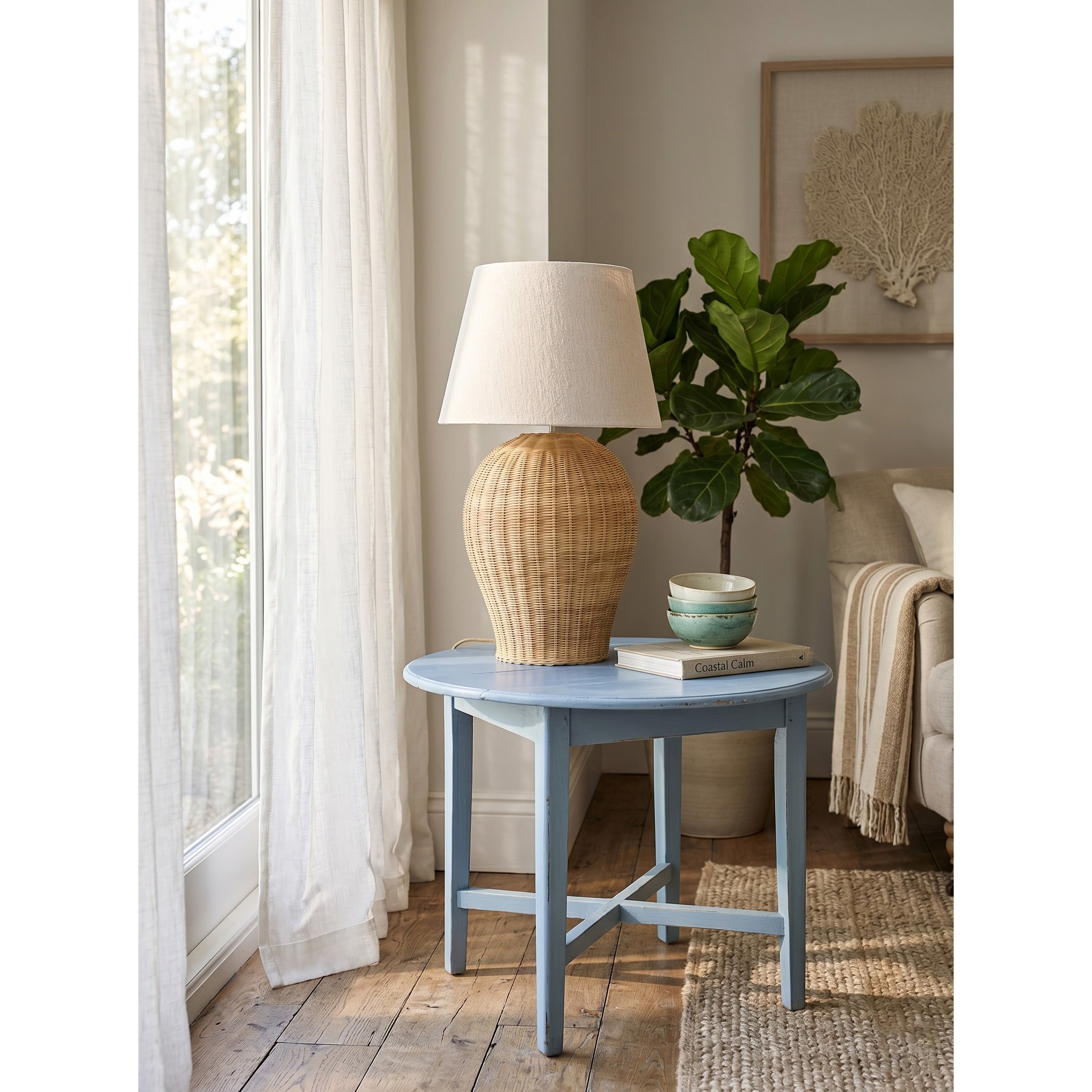 Angled view of the Saona Rattan Table Lamp.