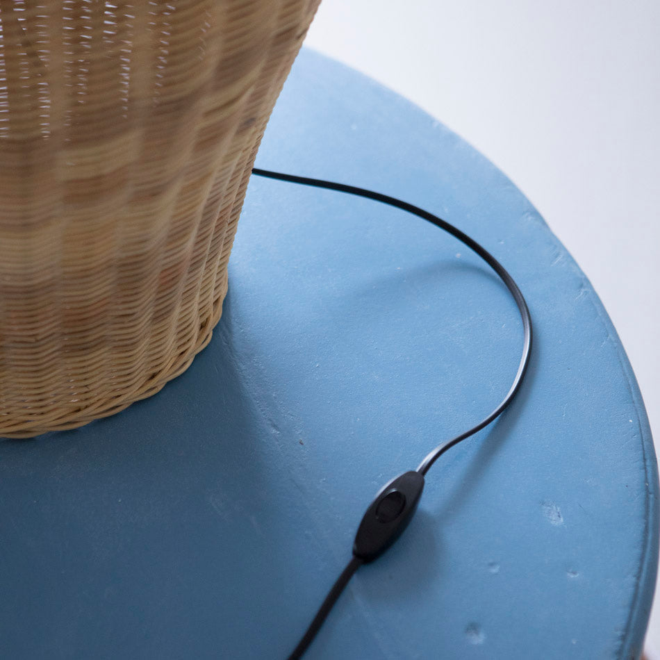 The Saona Rattan Table Lamp in an organic modern setting.