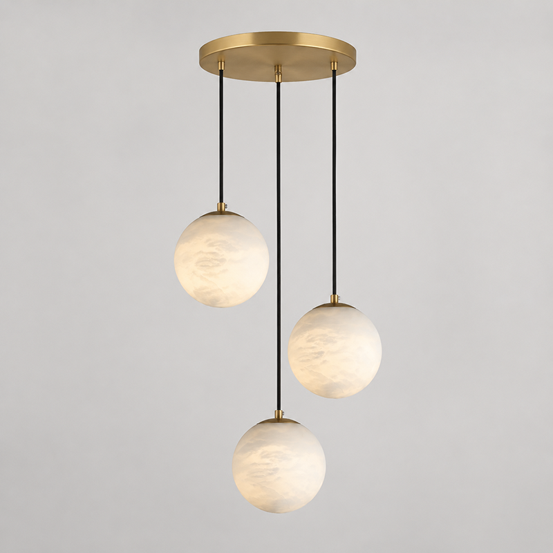 A 5-head Savina Chandelier hanging above a kitchen island.