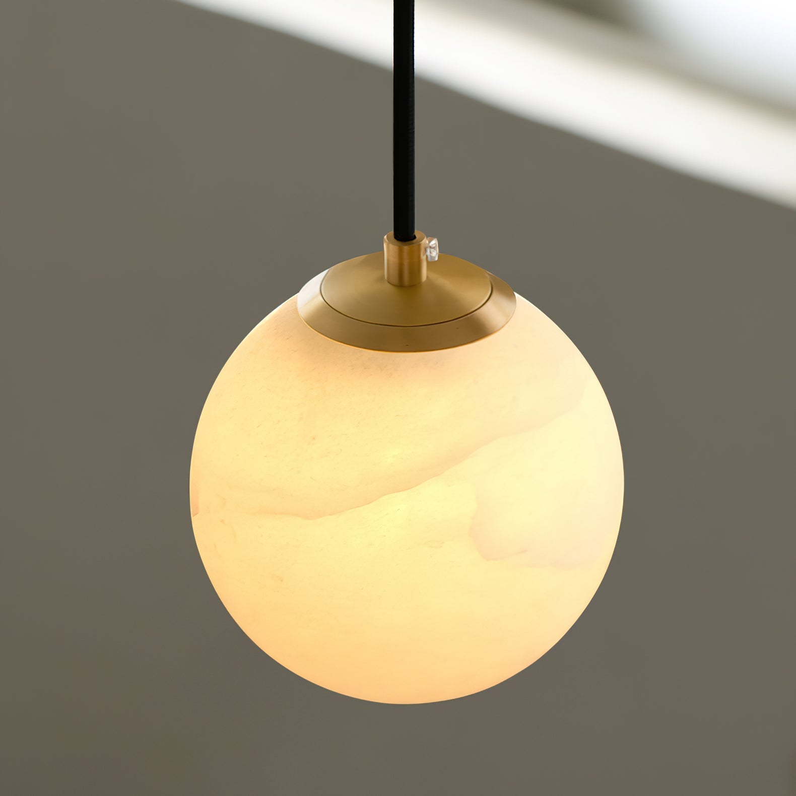 The chandelier shown in a room with high ceilings to emphasize its scale.