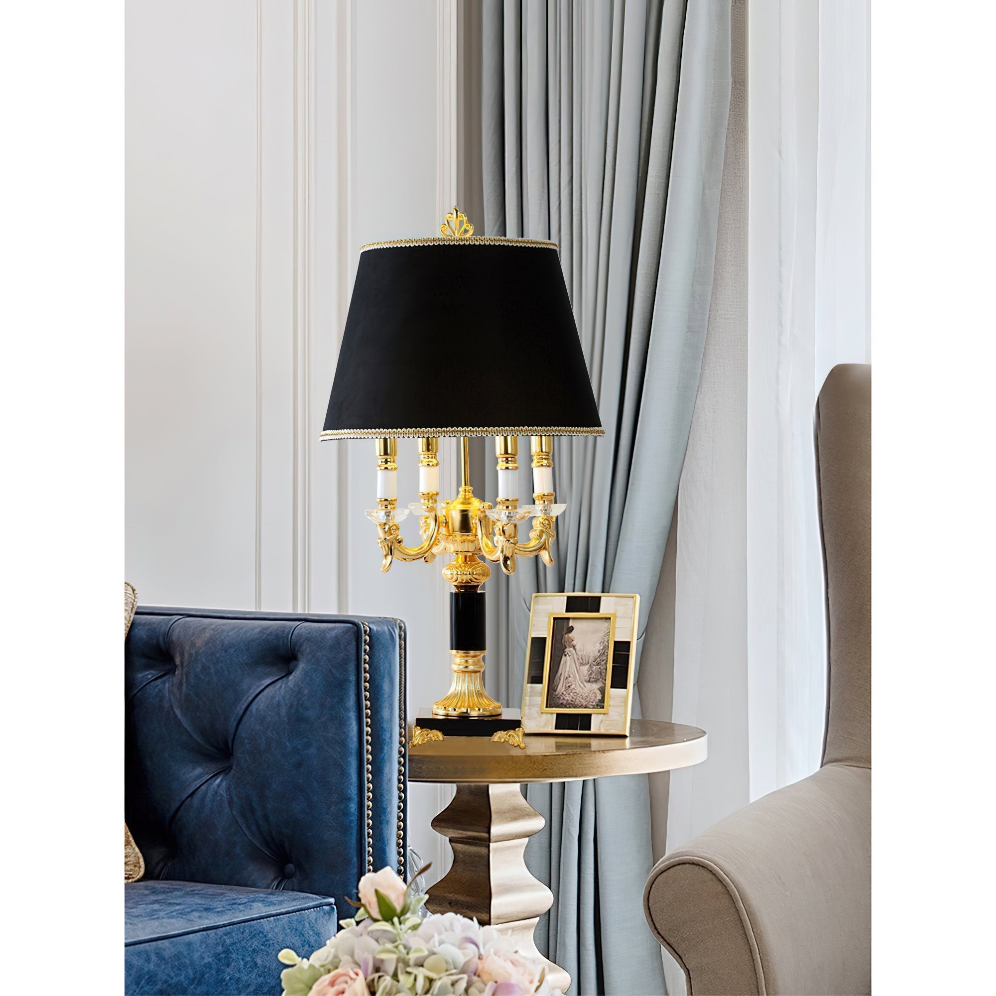 The lamp's base, highlighting the black lacquered column and gold details.