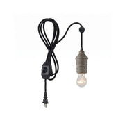 Silvares Wood Swag Light in a natural wood finish.