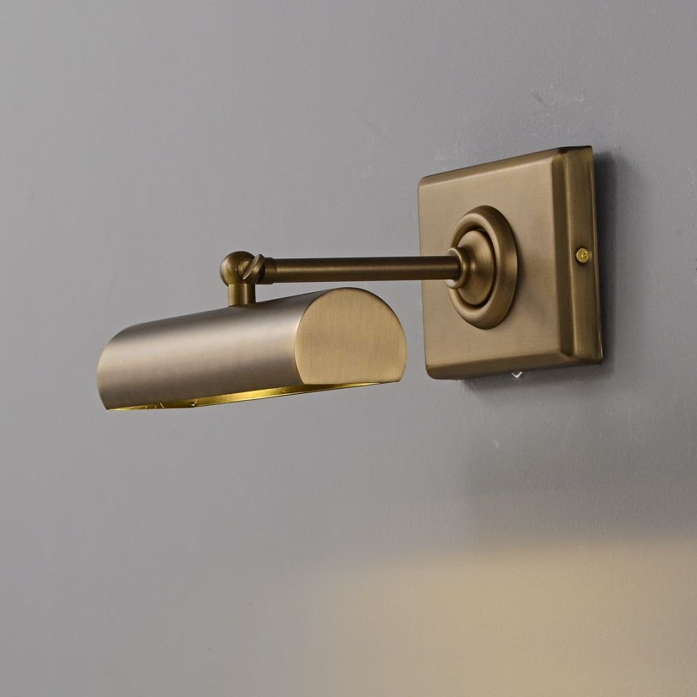 The elegant silhouette of the Steamer Wall Sconce against a light background.