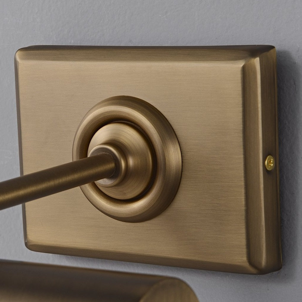 The wall sconce shown unlit to feature its design details.
