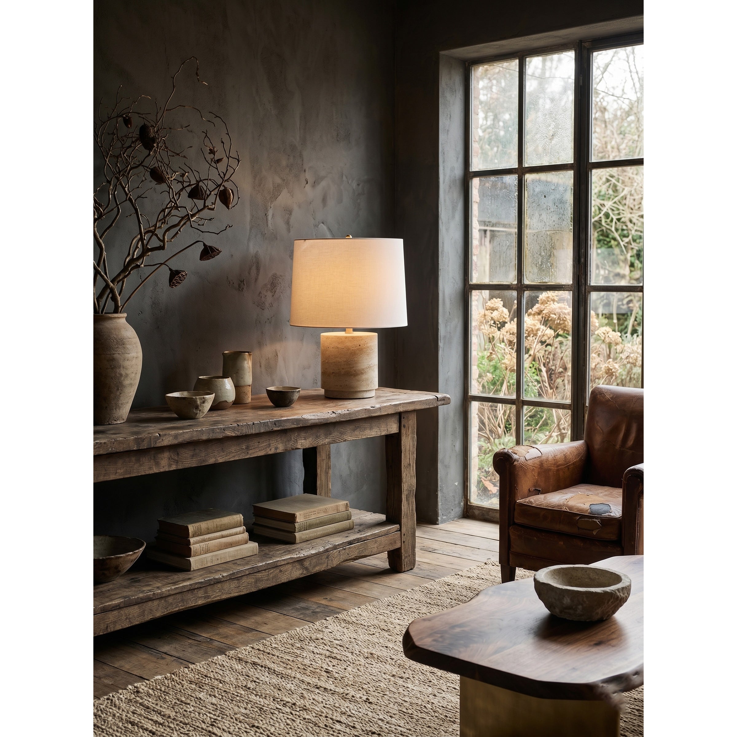 The lamp casting a serene and luminous glow in a dimly lit space.