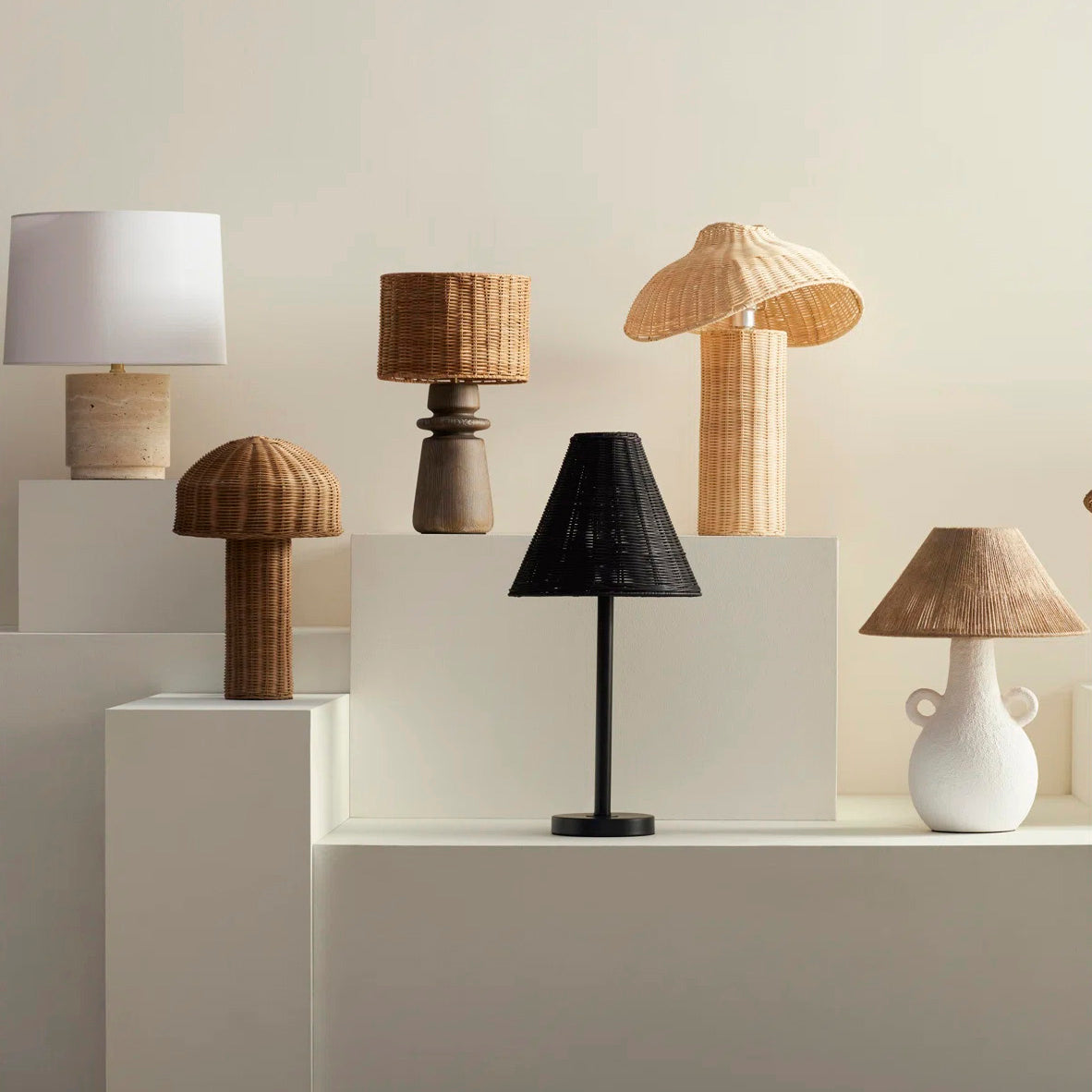The lamp shown to scale next to a modern armchair.