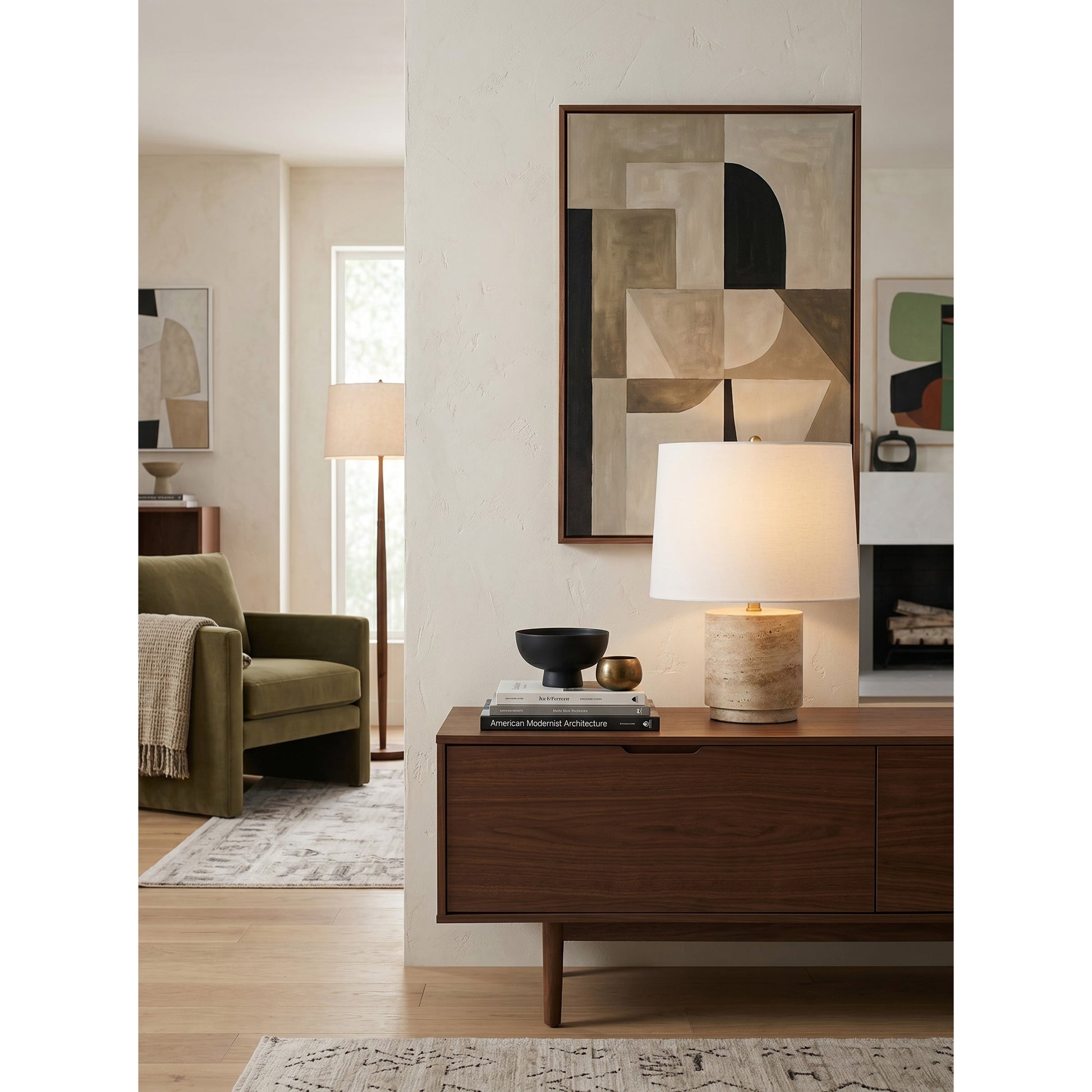 Angled view of the lamp, showing the contrast between the stone base and fabric shade.