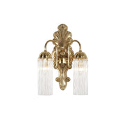 Front view of the Triest Wall Sconce with its brass backplate and two fluted glass shades.