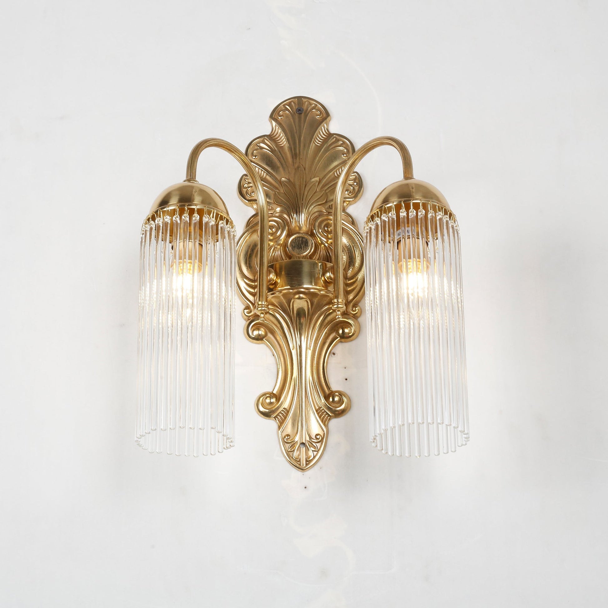 The Triest Wall Sconce against a light wall for contrast.
