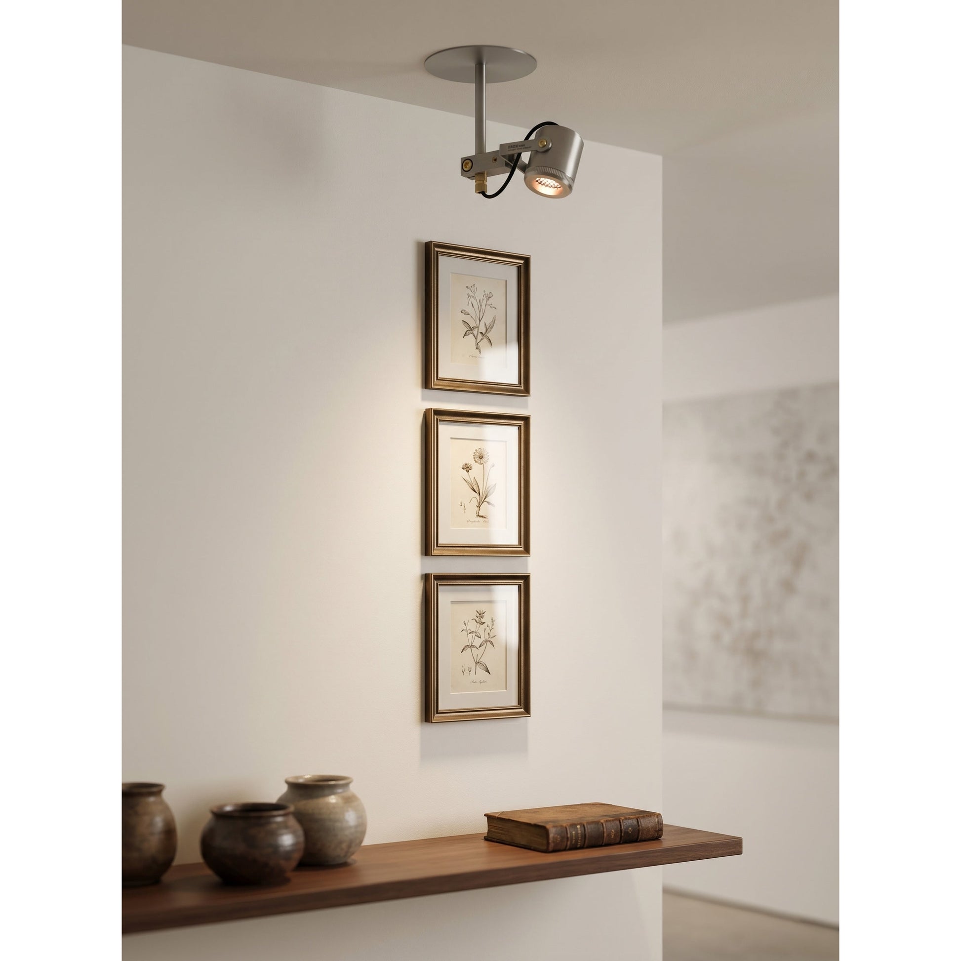 Lifestyle image of the Triton flush mount illuminating a contemporary space.
