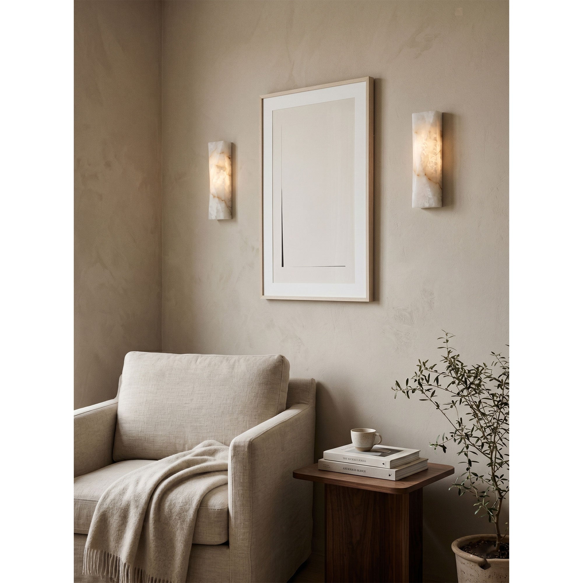 Detail of the gold metal fixture on the Tropez Alabaster Wall Sconce.