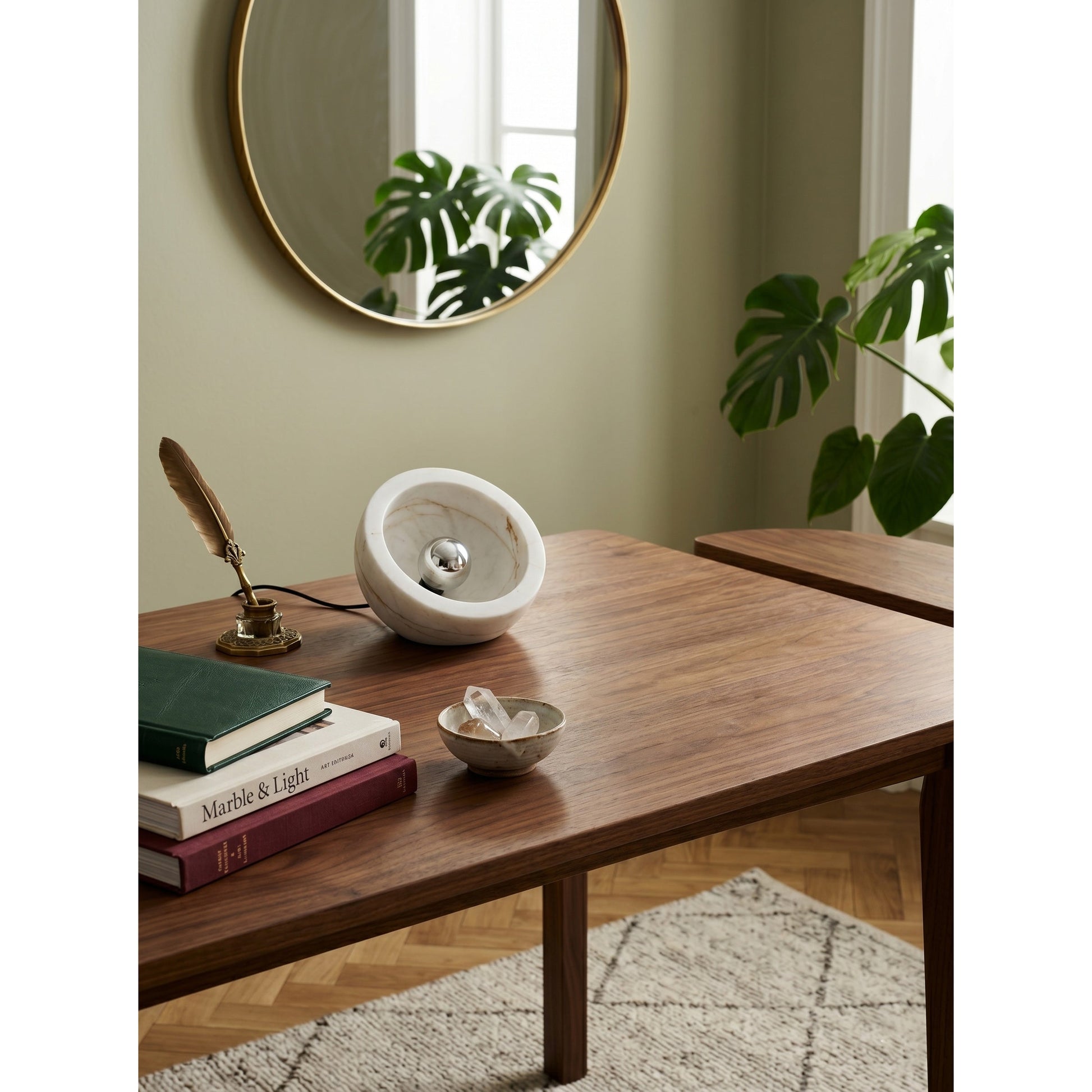 The Tsuki Table Lamp shown lit, casting a soft ambient glow.
