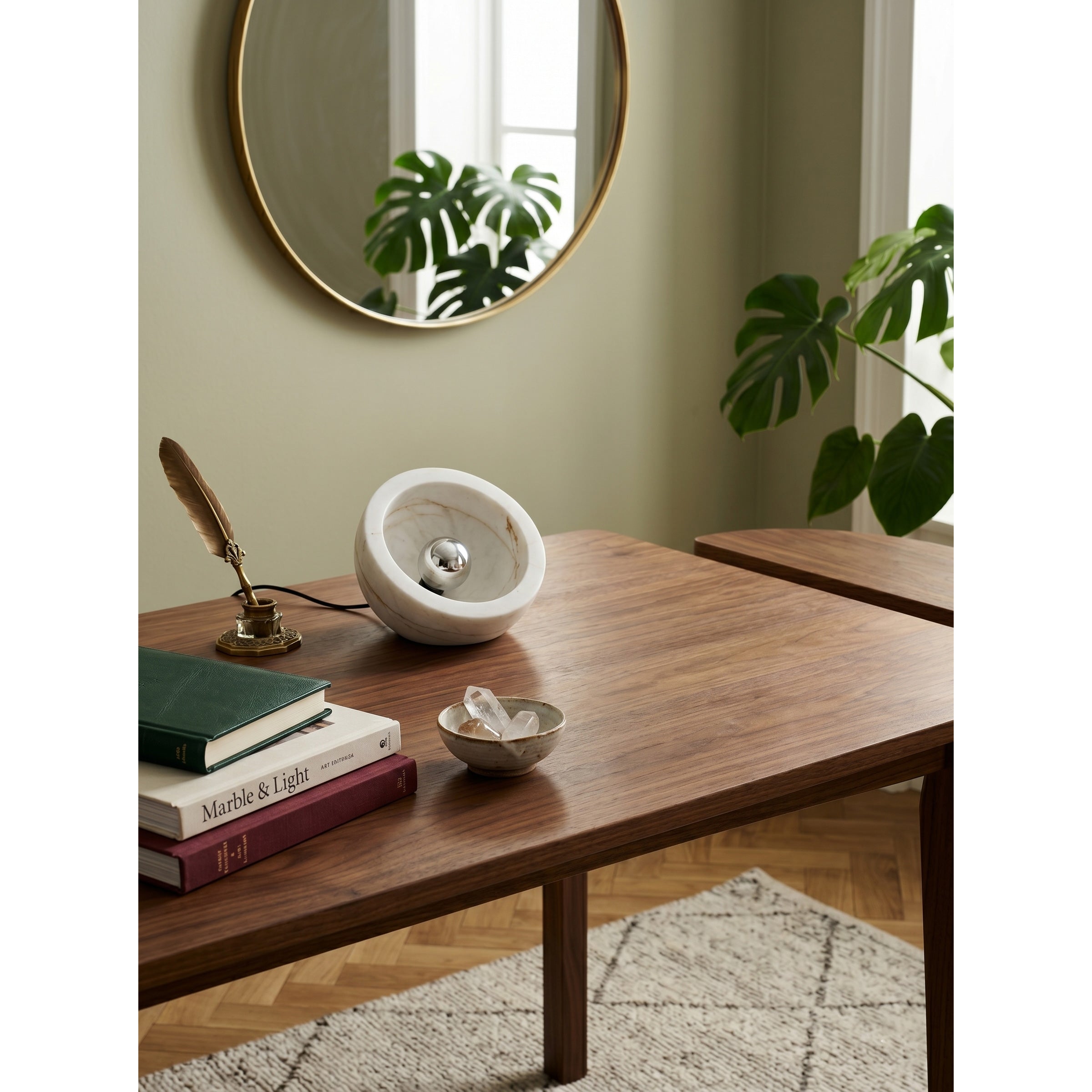 The Tsuki Table Lamp shown lit, casting a soft ambient glow.