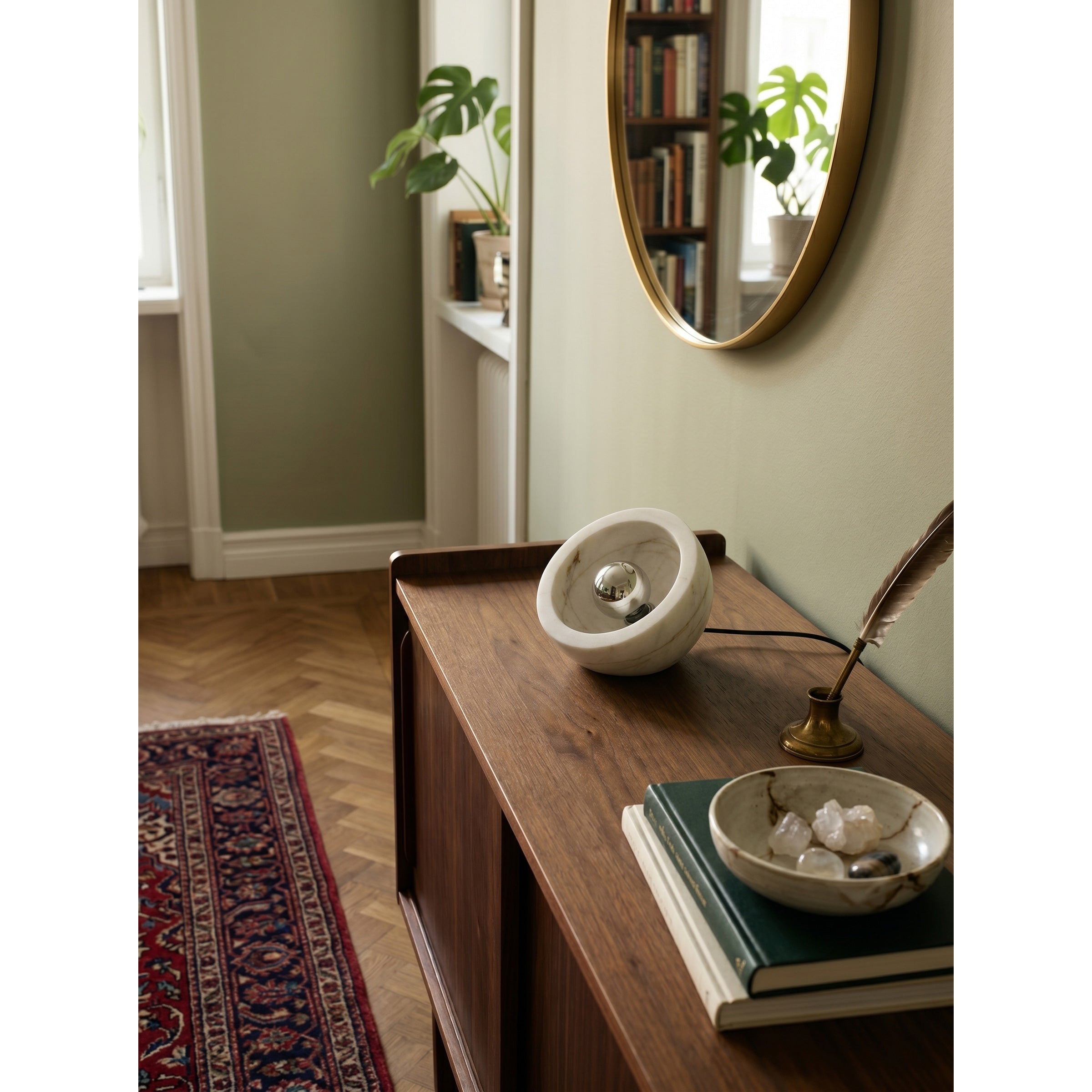 The Tsuki Table Lamp on an entryway console table.