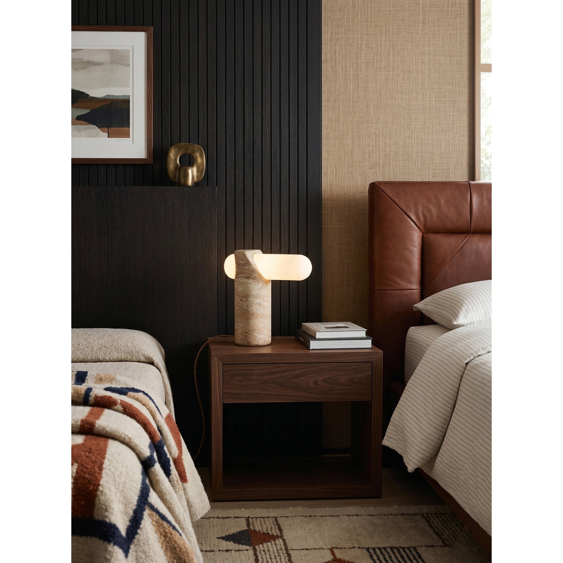Side profile of the sculptural table lamp.