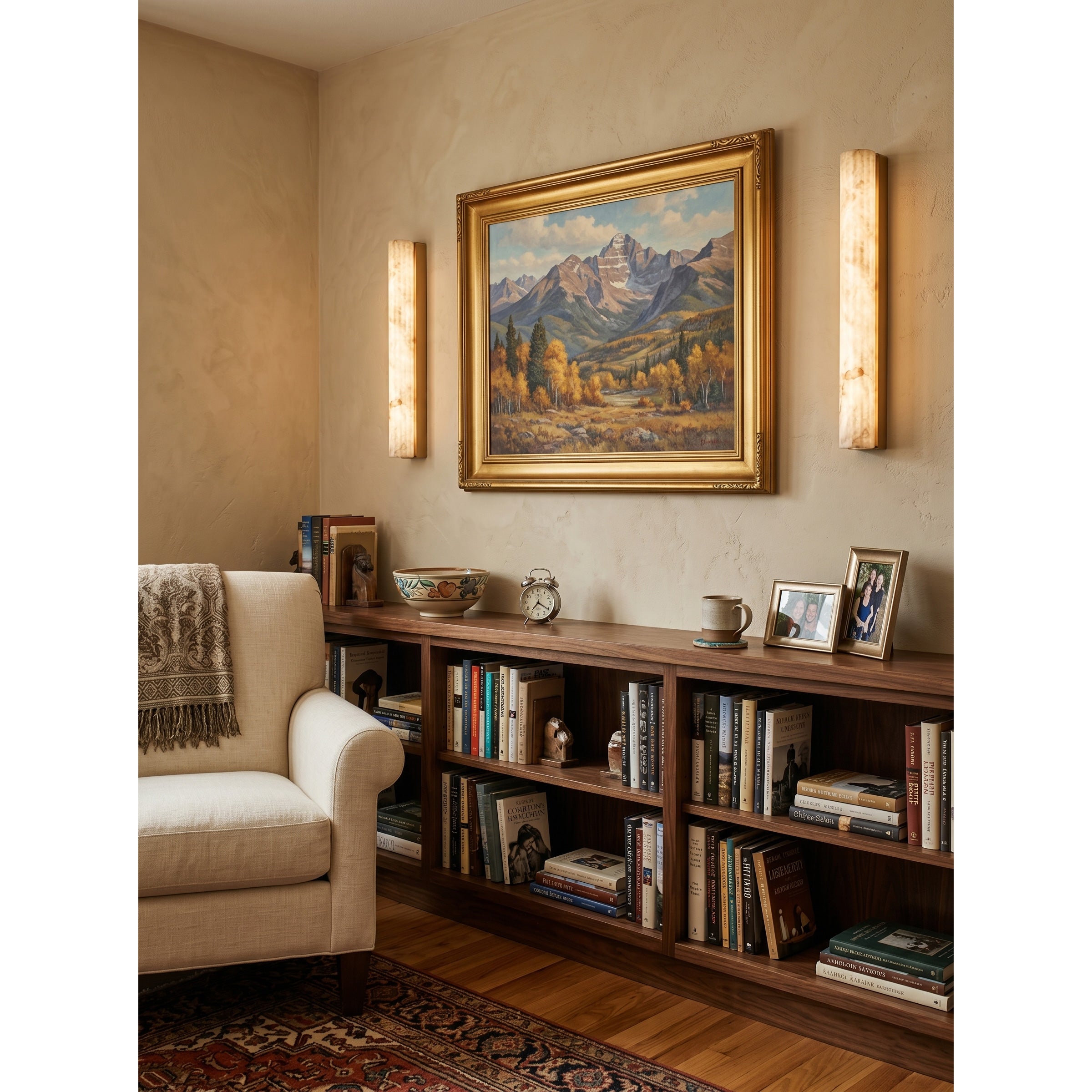 Lifestyle image showing the sconce creating a moody ambiance in a primary suite.