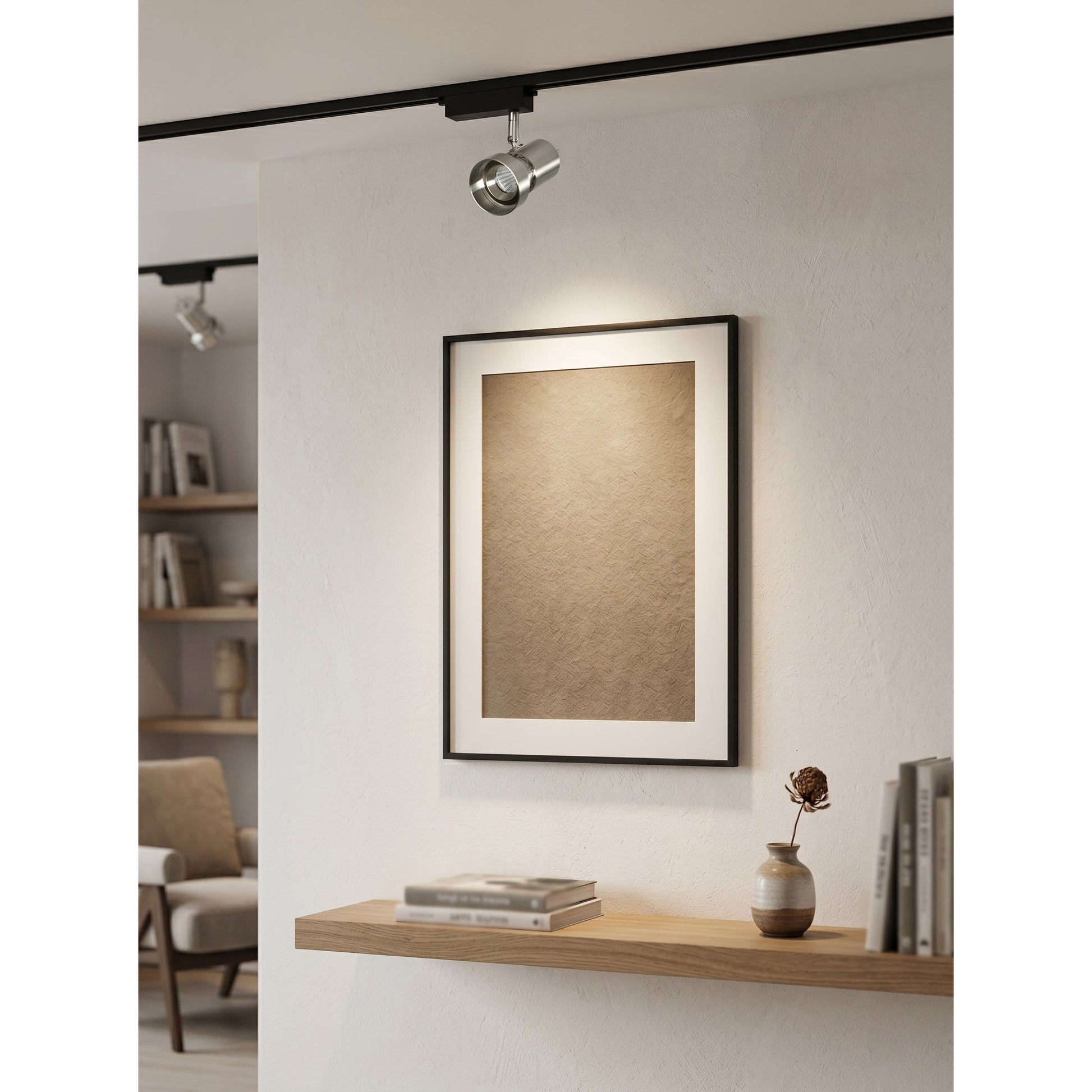 VidaLite Track Light illuminating a gallery hallway.