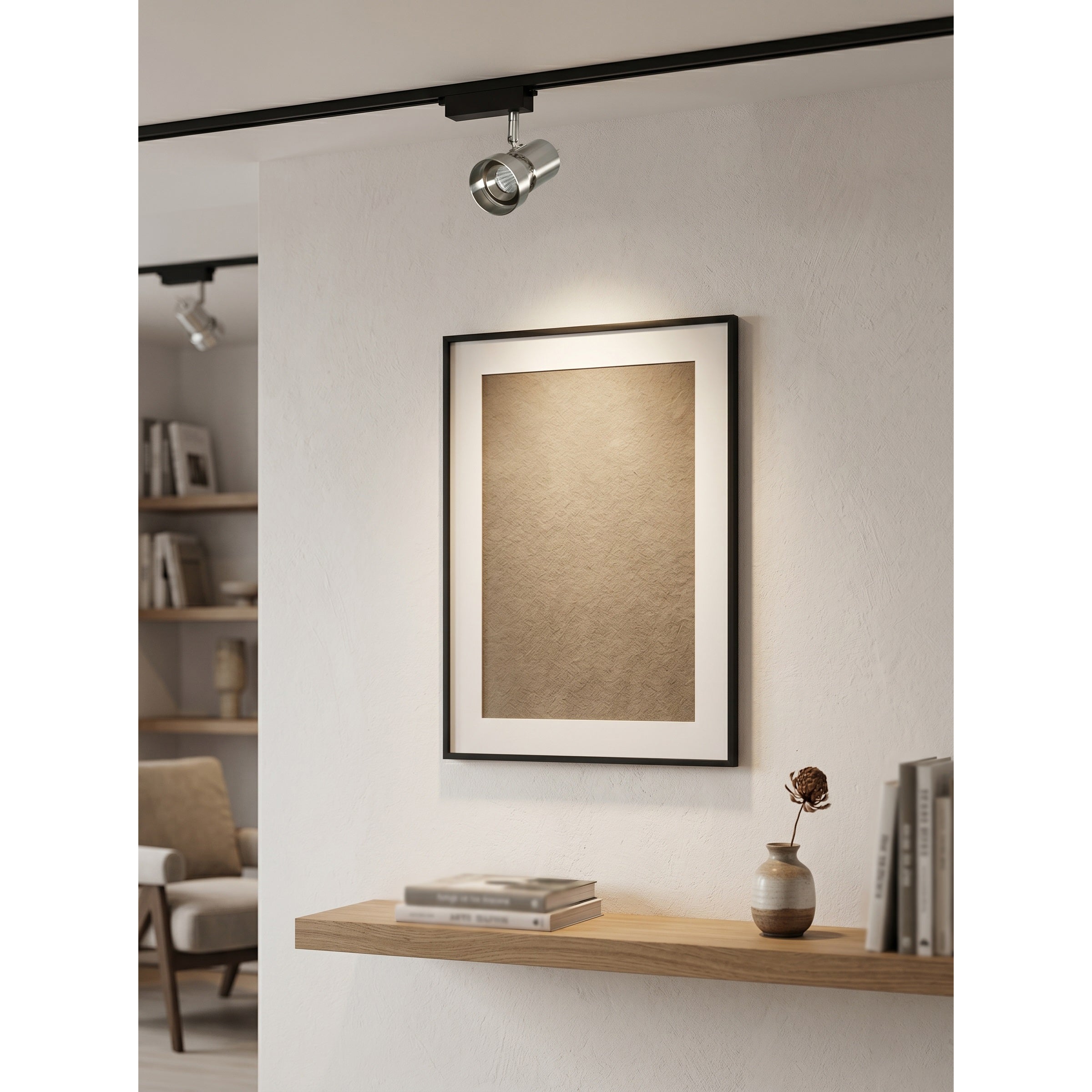 VidaLite Track Light illuminating a gallery hallway.