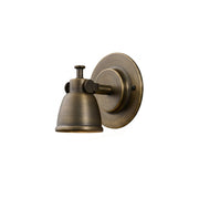 Waldo Wall Sconce in antique bronze finish against a light background.