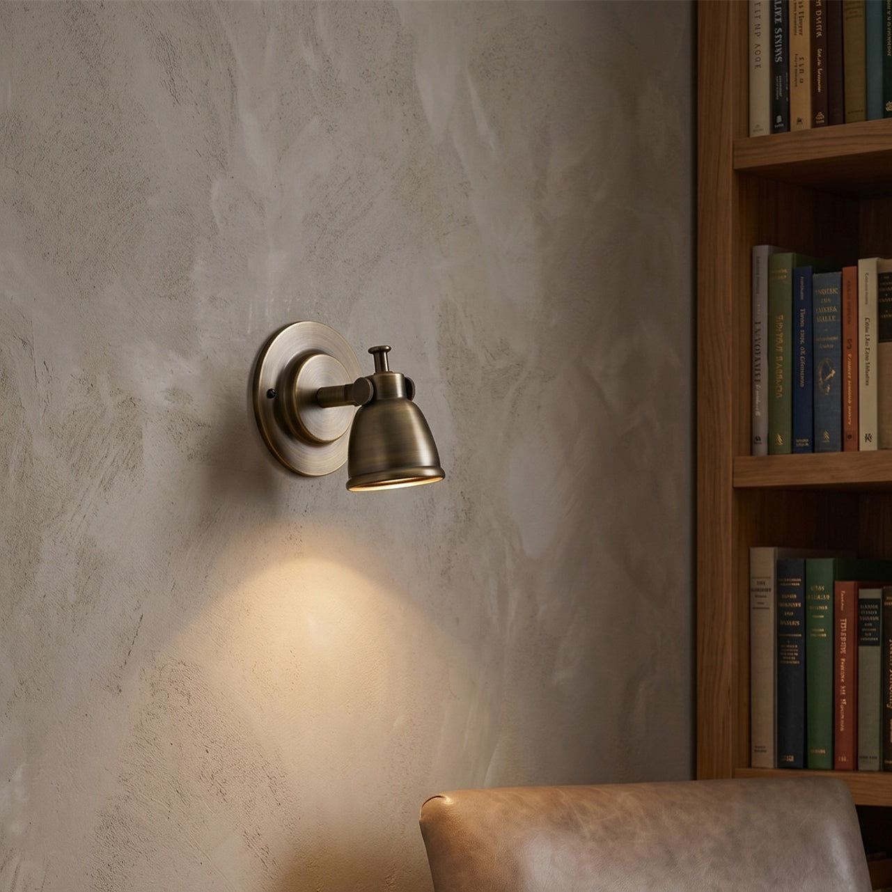 Side view of the Waldo Wall Sconce showing its adjustable bell shade.