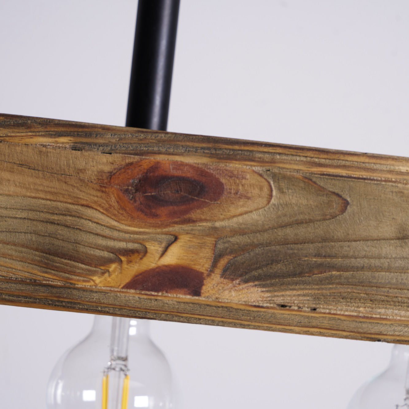 View of the top of the wood beam and its mounting hardware.