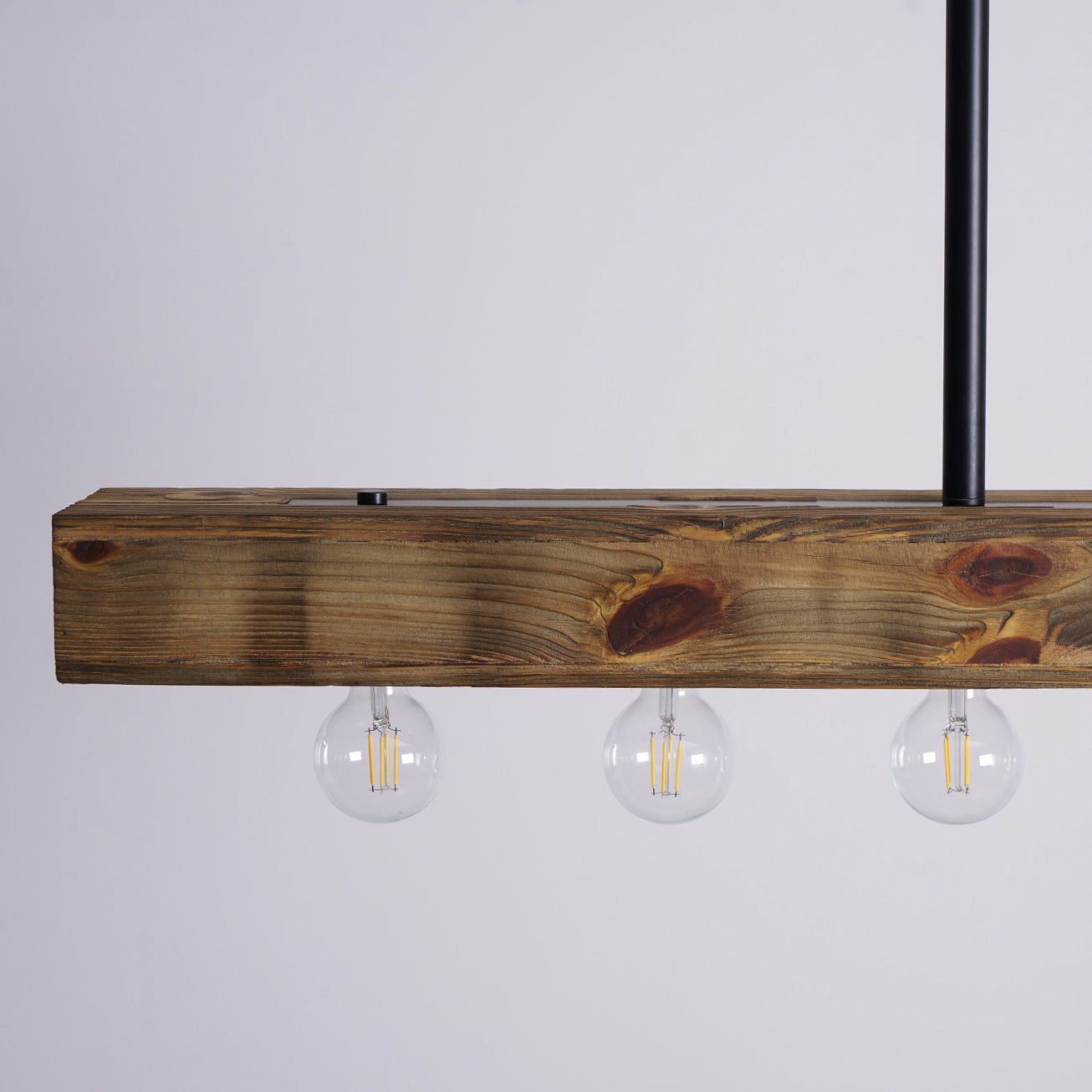 The texture of the distressed wood finish.