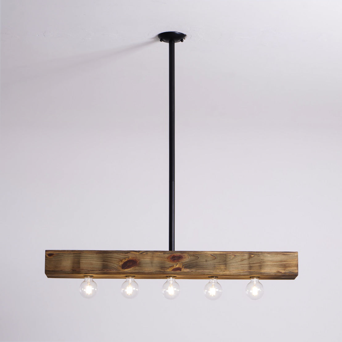 The linear chandelier from a distance, showing its scale.