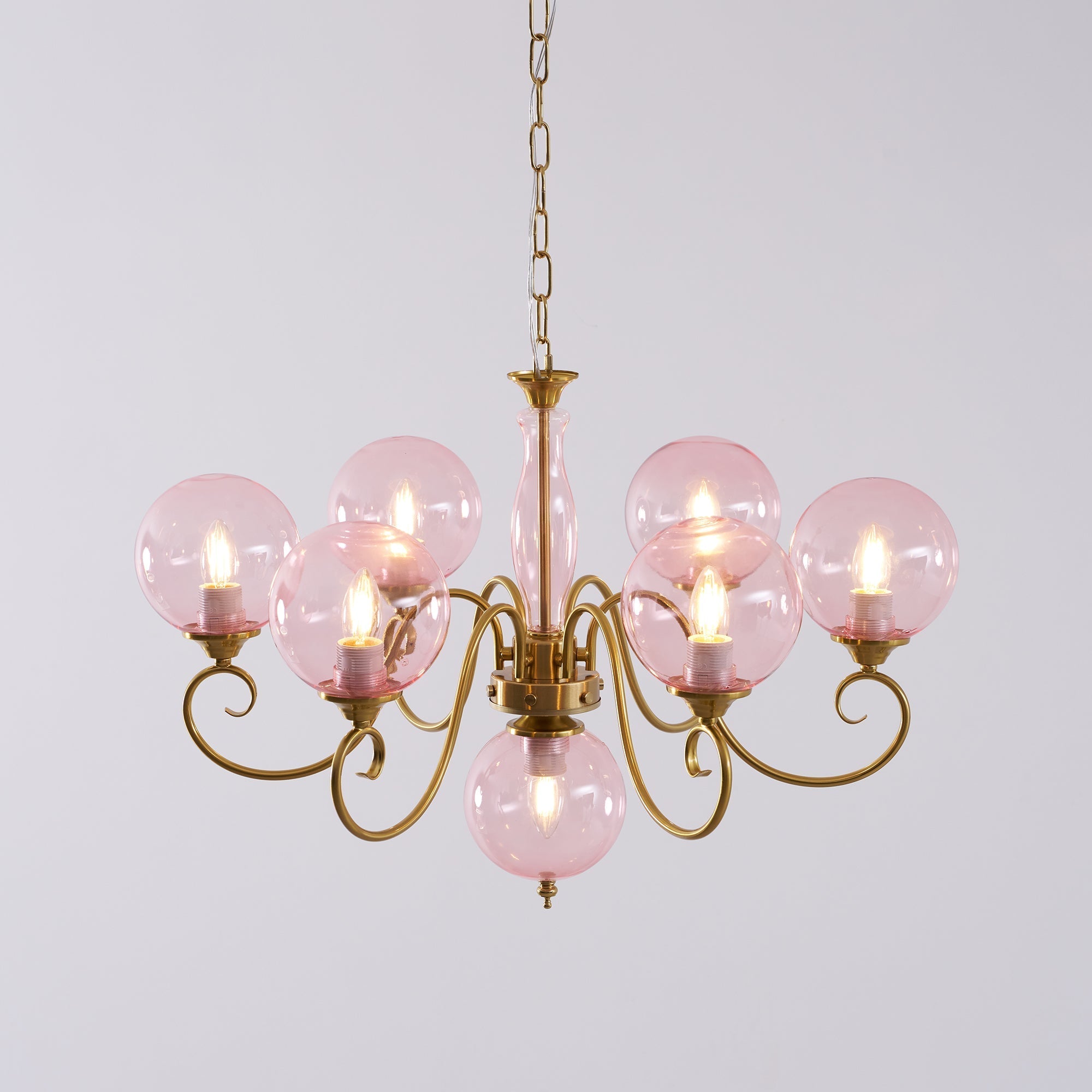 Close-up of the light fixture with a globe-style bulb installed.