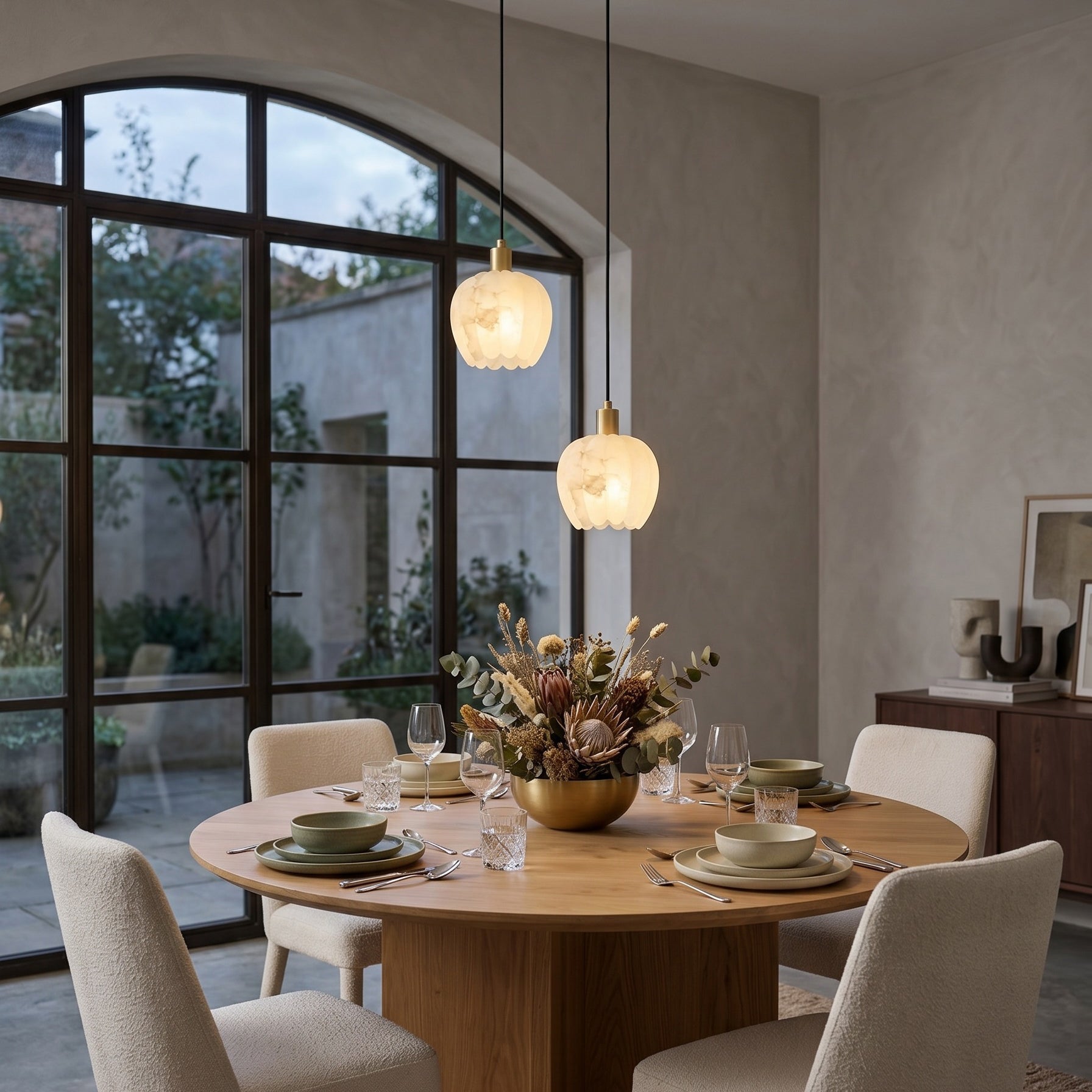 Side profile of the chandelier showing the staggered globe arrangement.