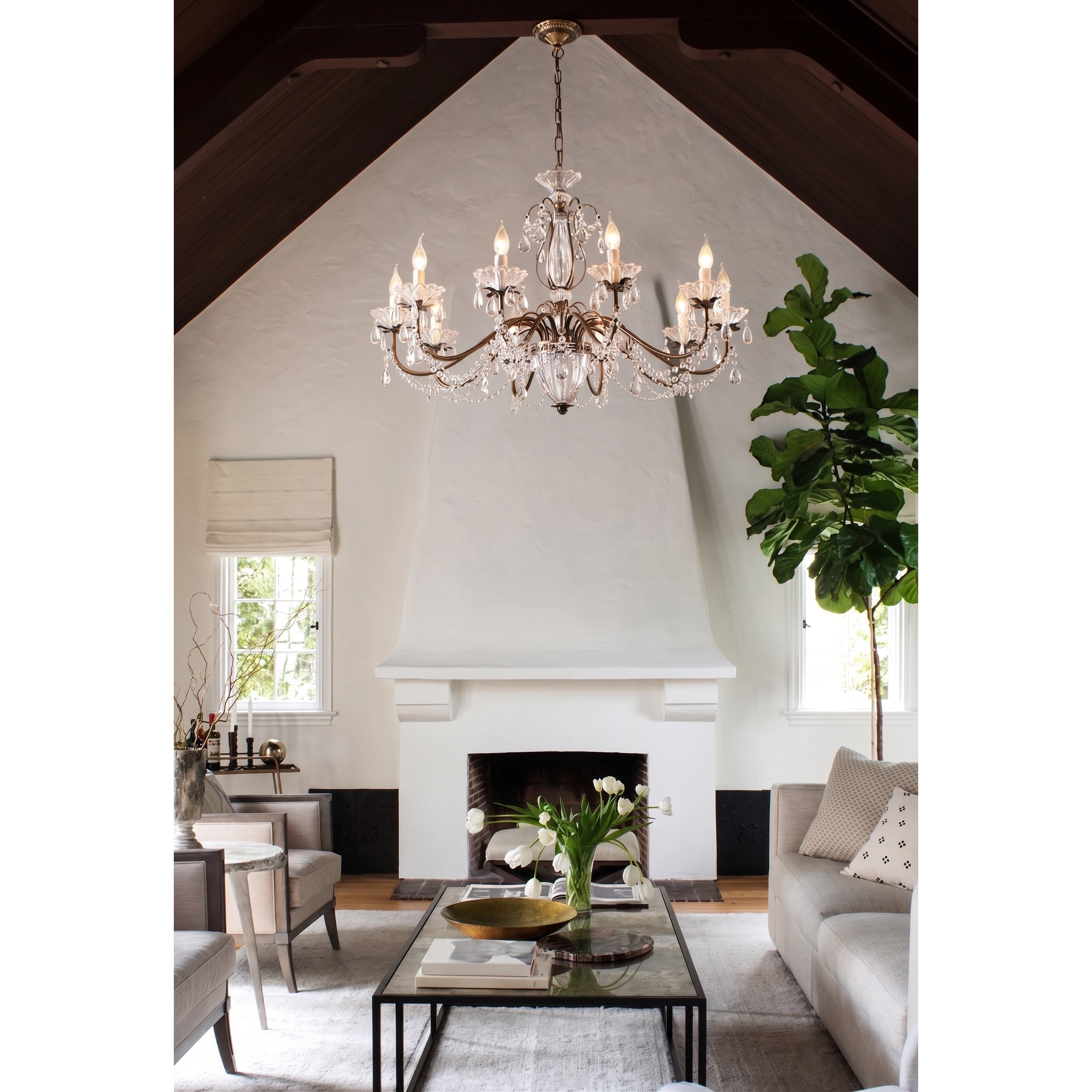 The chandelier unlit, showcasing its elegant form and materials.