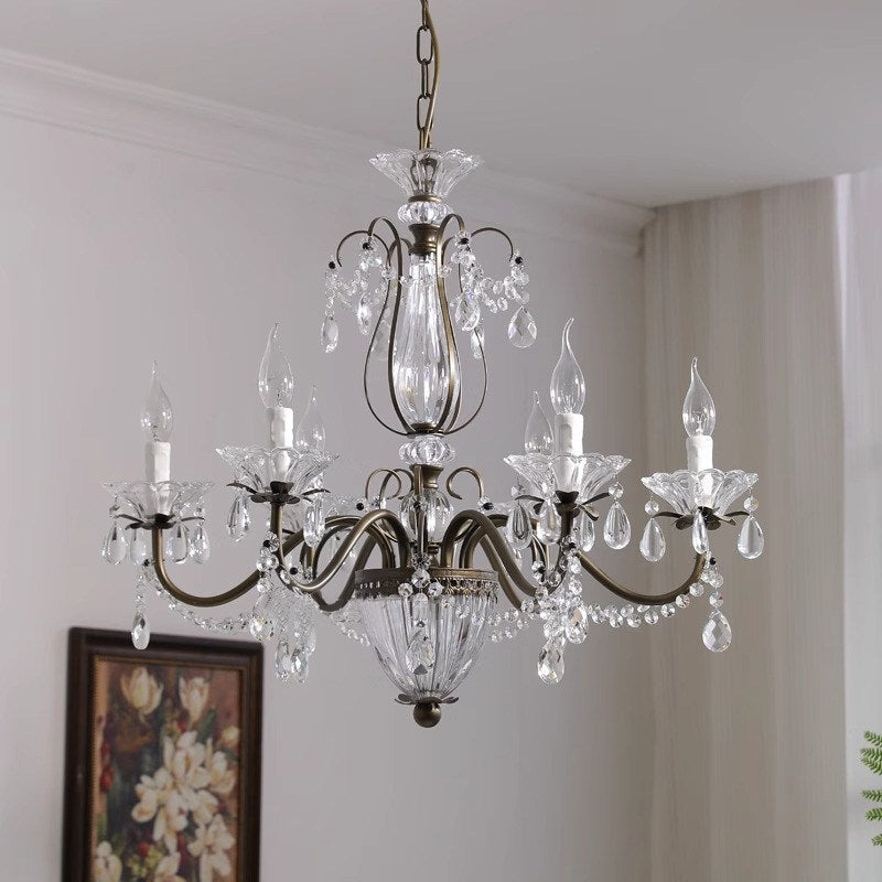 The 6-head version of the Venatici Crystal Chandelier in a living space.