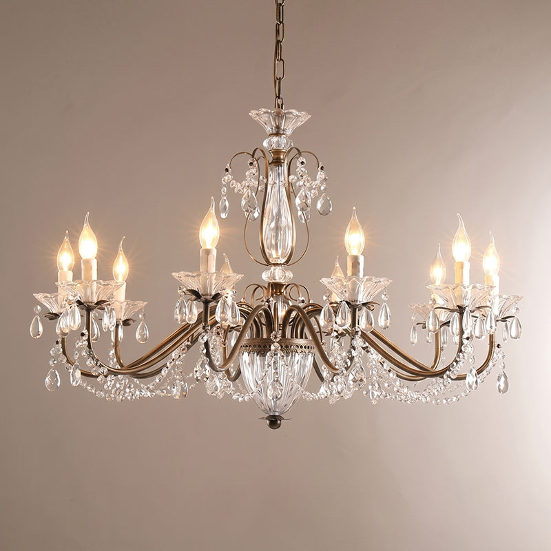 The chandelier against a dark background to highlight the crystal sparkle.