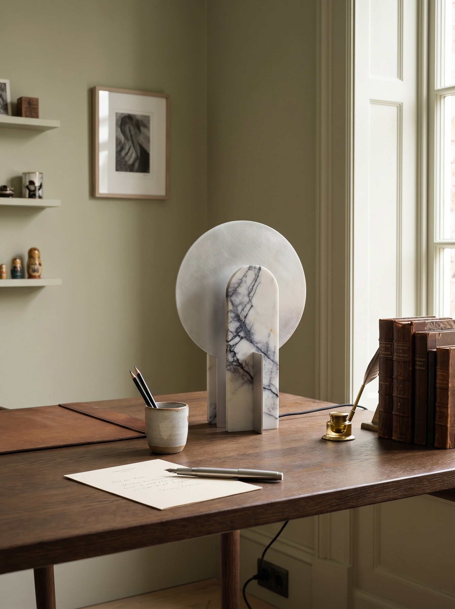 Close-up of the Alice Table Lamp's natural white marble veining.