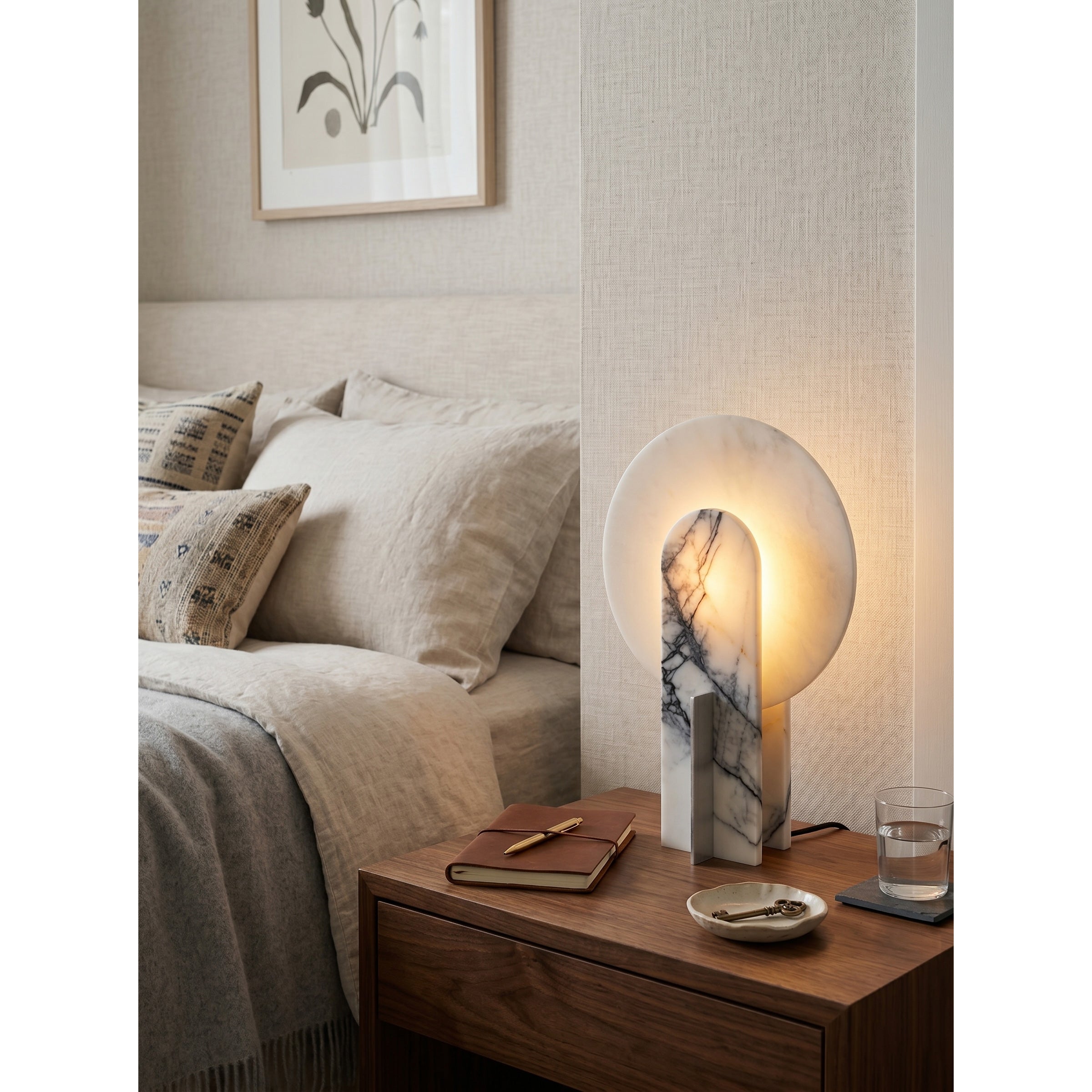 Alice Table Lamp placed on a modern living room fireplace mantel.