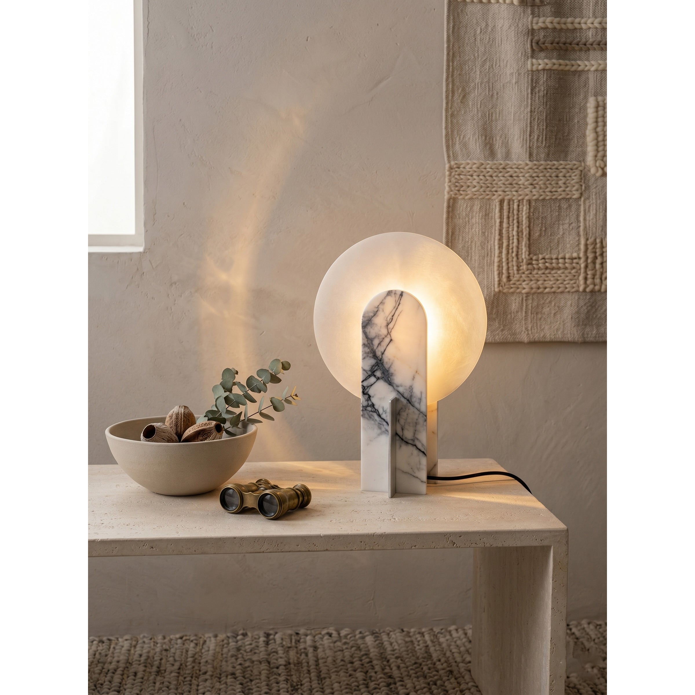 Lifestyle image of the Alice Table Lamp in a refined bedroom setting.