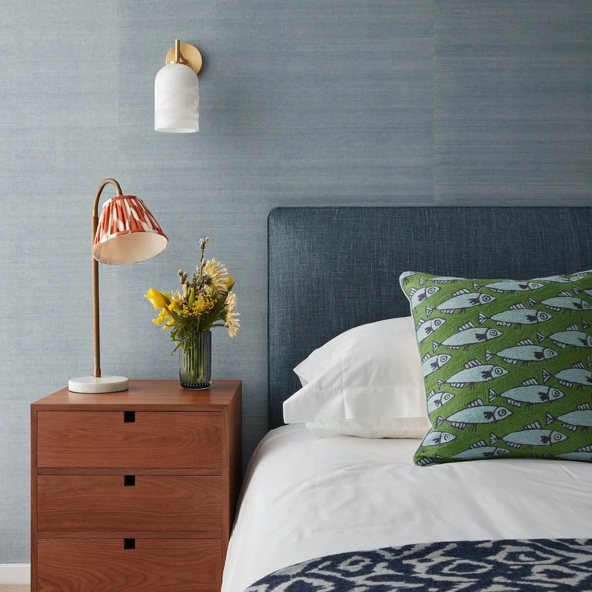 Side view of the Rae Wall Lamp, showing its smooth, rounded profile.