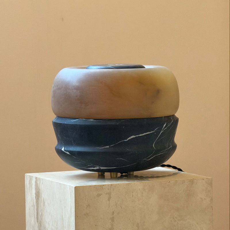 The Ramson lamp with the light turned on, highlighting the shade's texture.