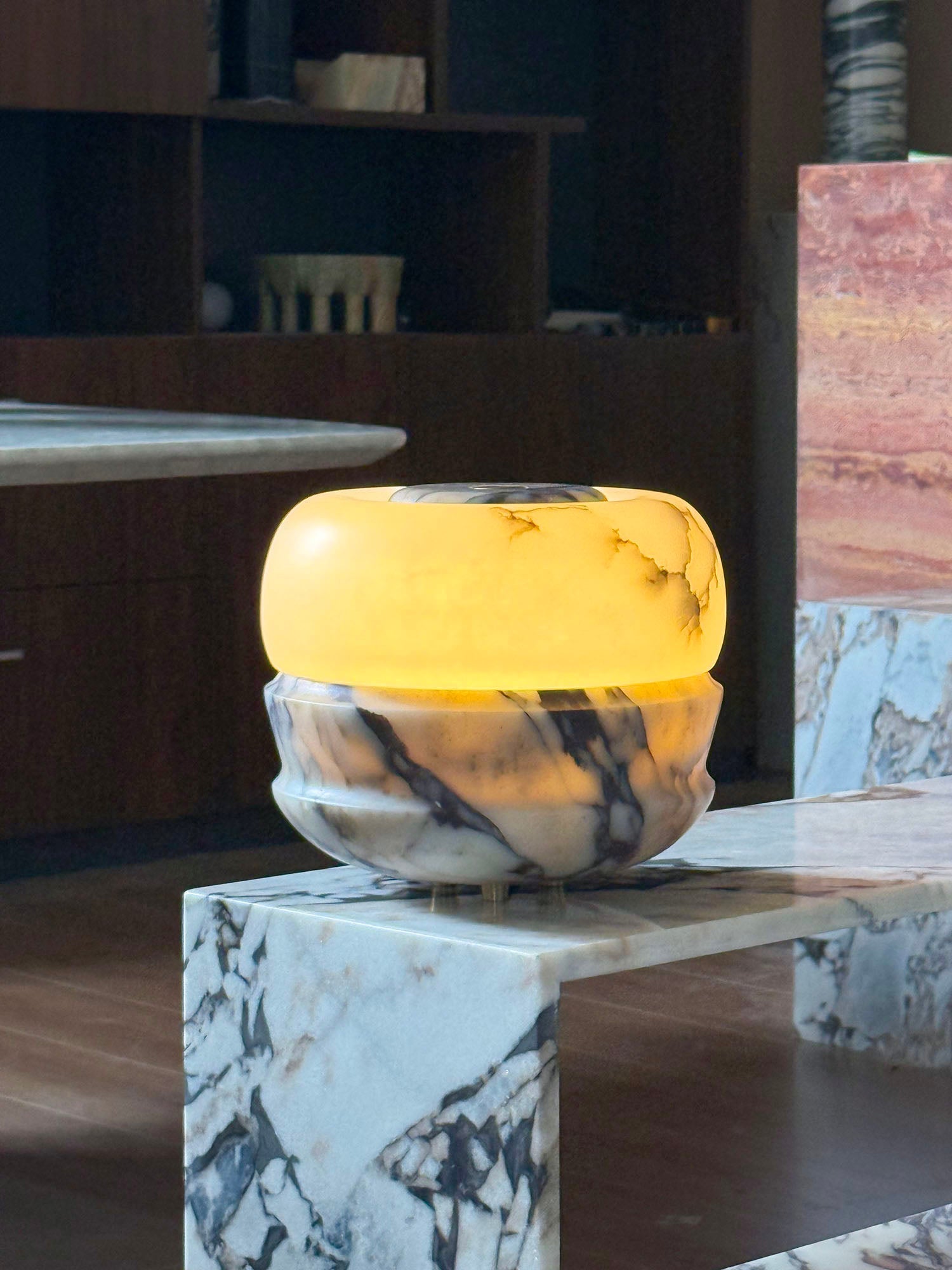 Detail shot of the natural veining in the white marble base.