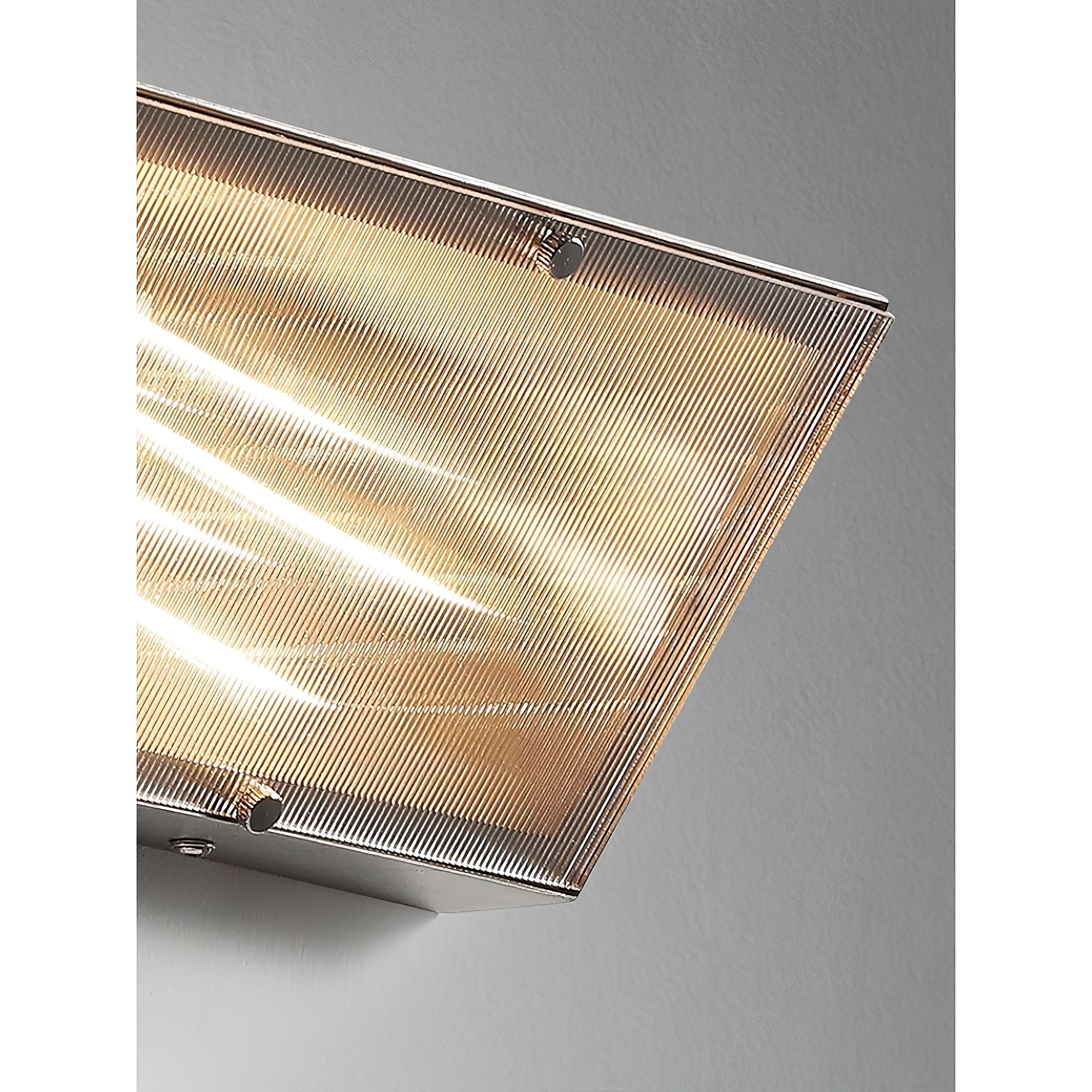 Close-up on the integrated LED light source within the lamp.