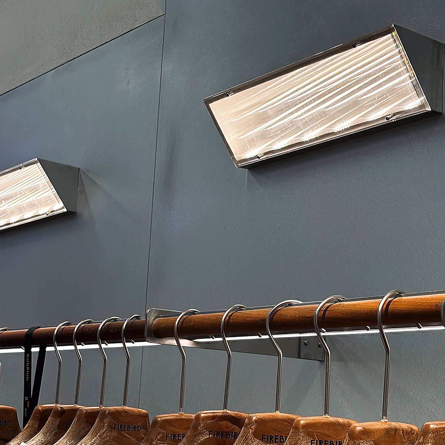 Close-up of the Recbox Wall Lamp's chrome finish.