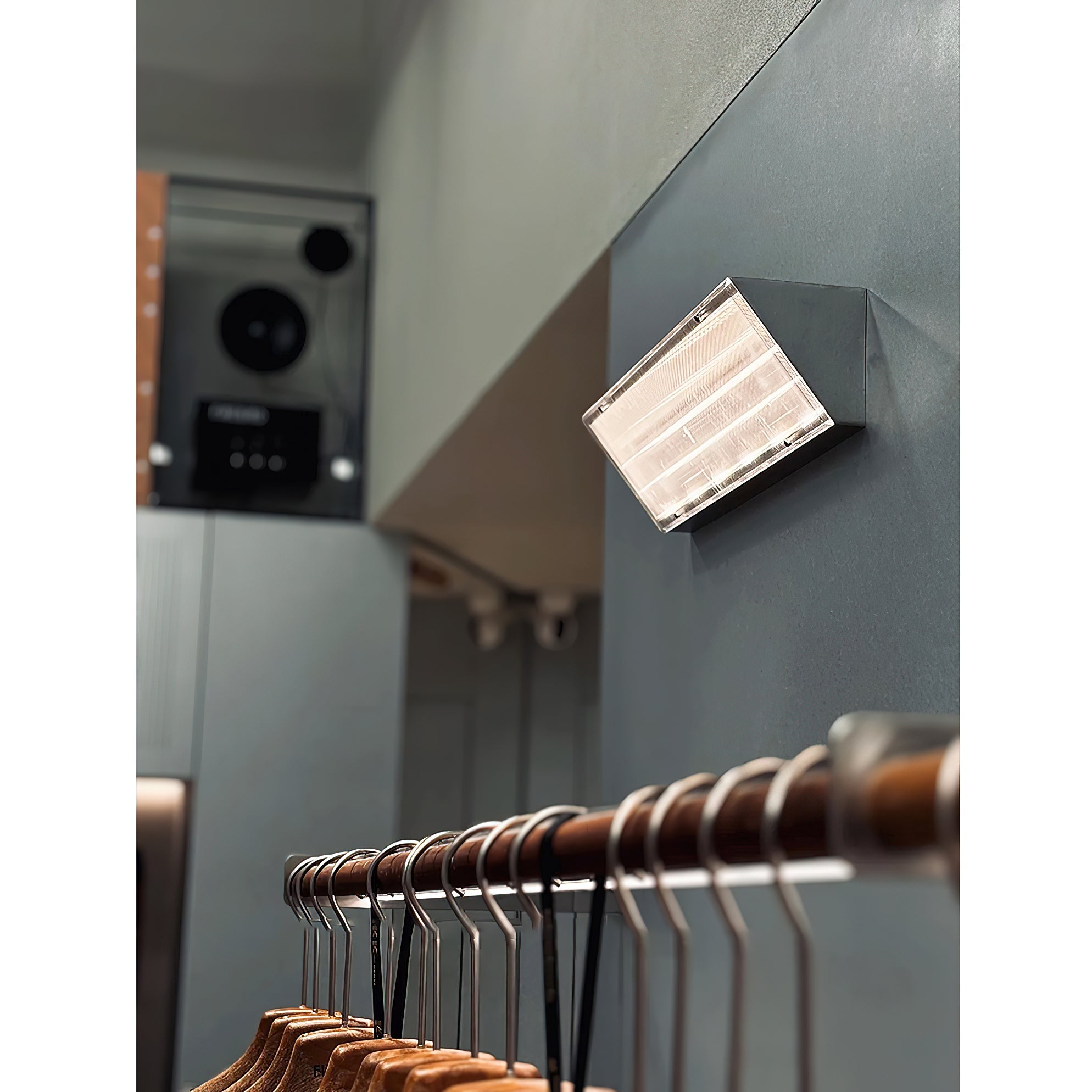 The Recbox Wall Lamp in a modern living room setting.