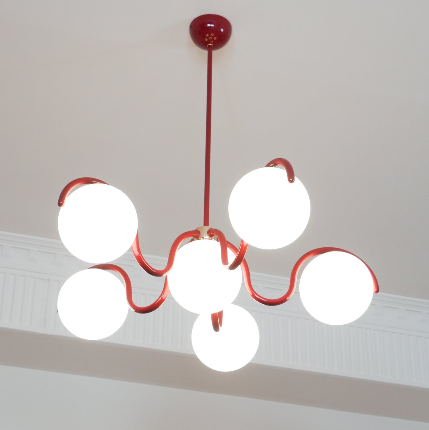 Pheva Curve Linear Chandelier Red&Silver - Neutralighting