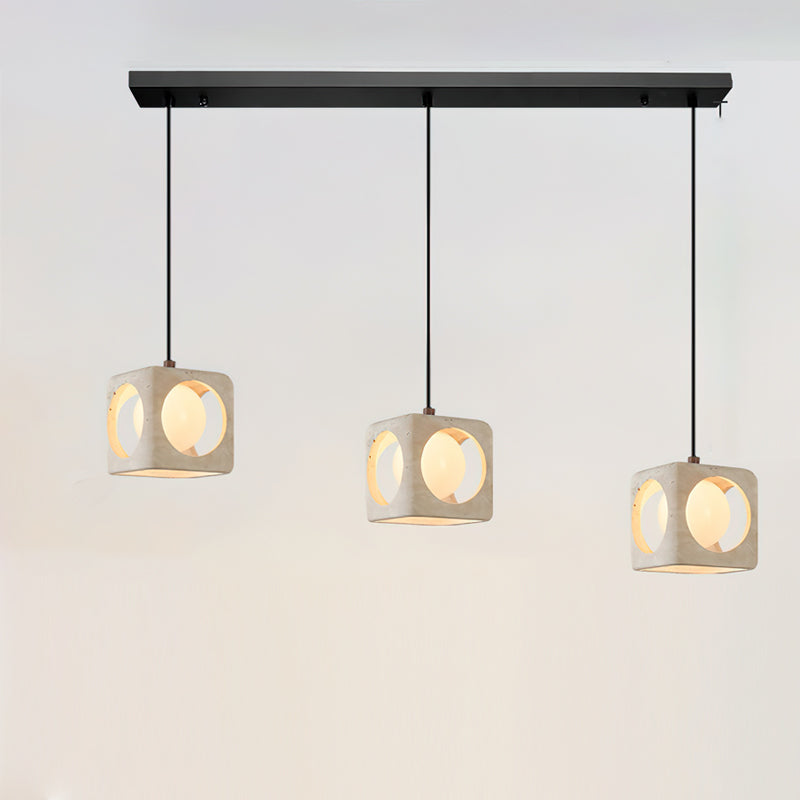 The internal frosted glass globe diffuser of the pendant light.