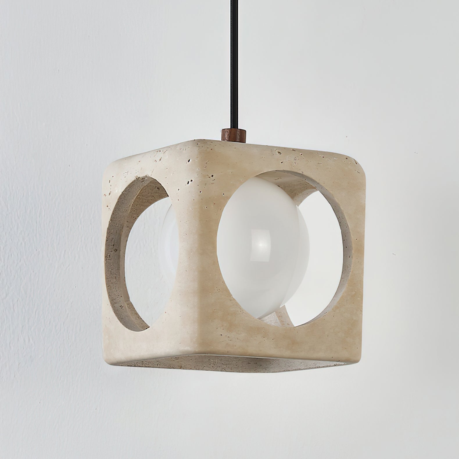 View of the pendant light in a minimalist living room setting.