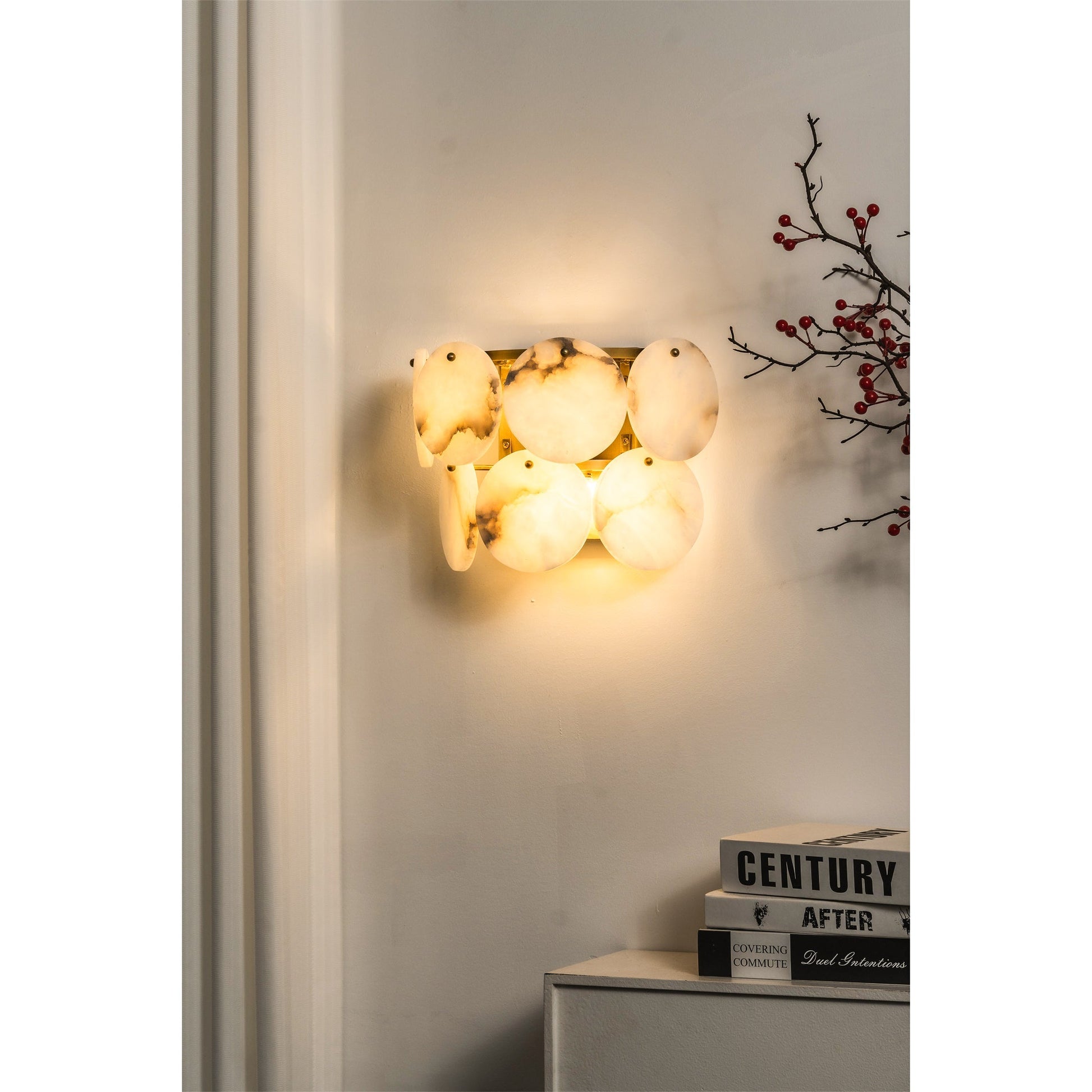 Lifestyle image of the lamp above a side table.