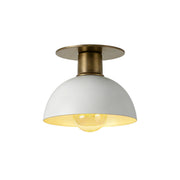 Rodanthe Ceiling Lamp in antique brass finish against a neutral wall.