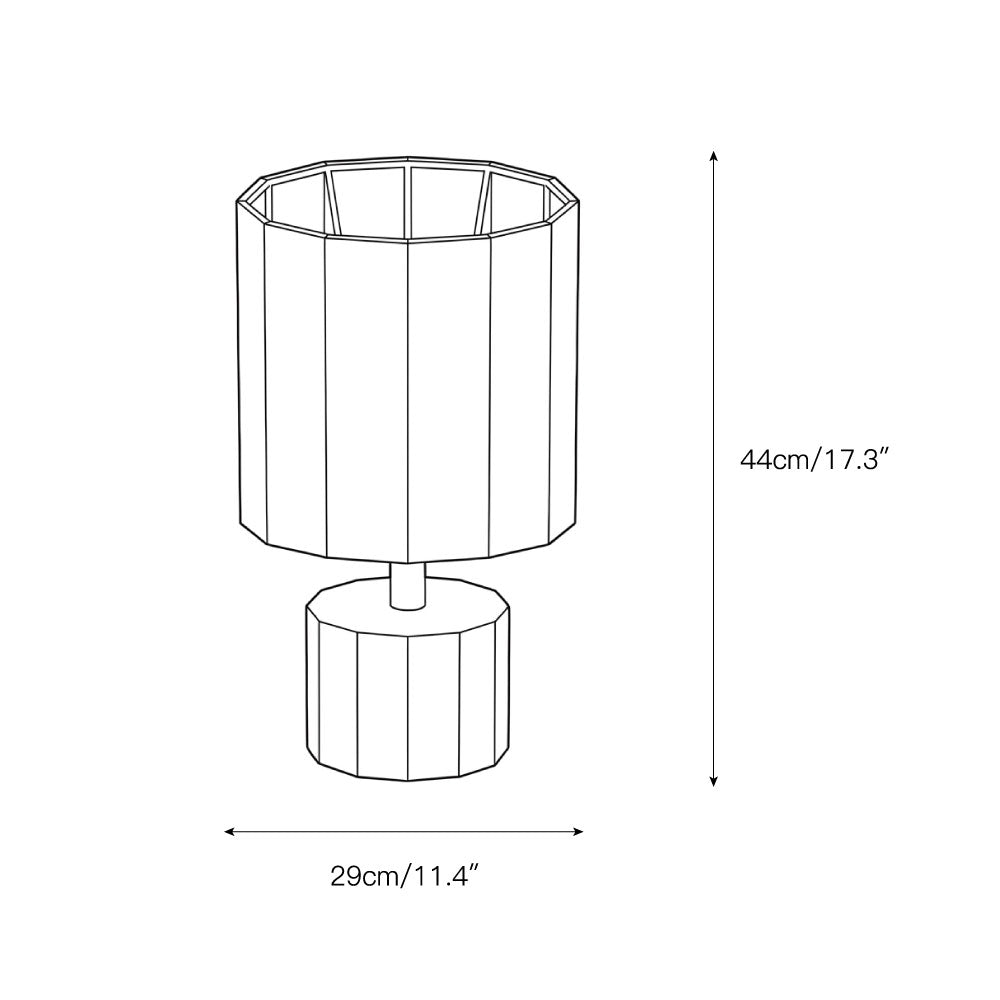 The table lamp illuminating a modern living room setting.