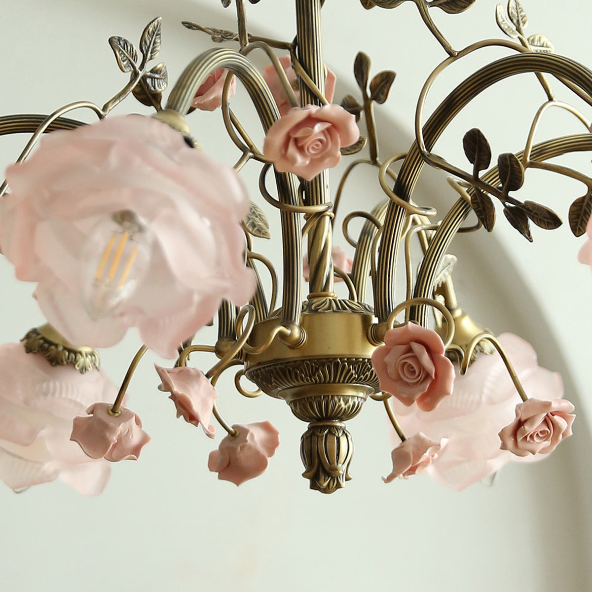 The texture and finish of the antique brass frame in a detailed close-up.