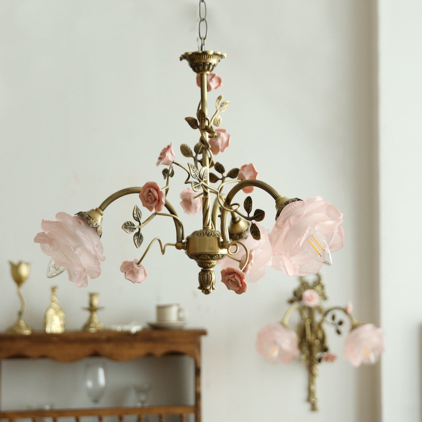 Angled view of the Rosalie Floral Chandelier highlighting its glass rose shades.