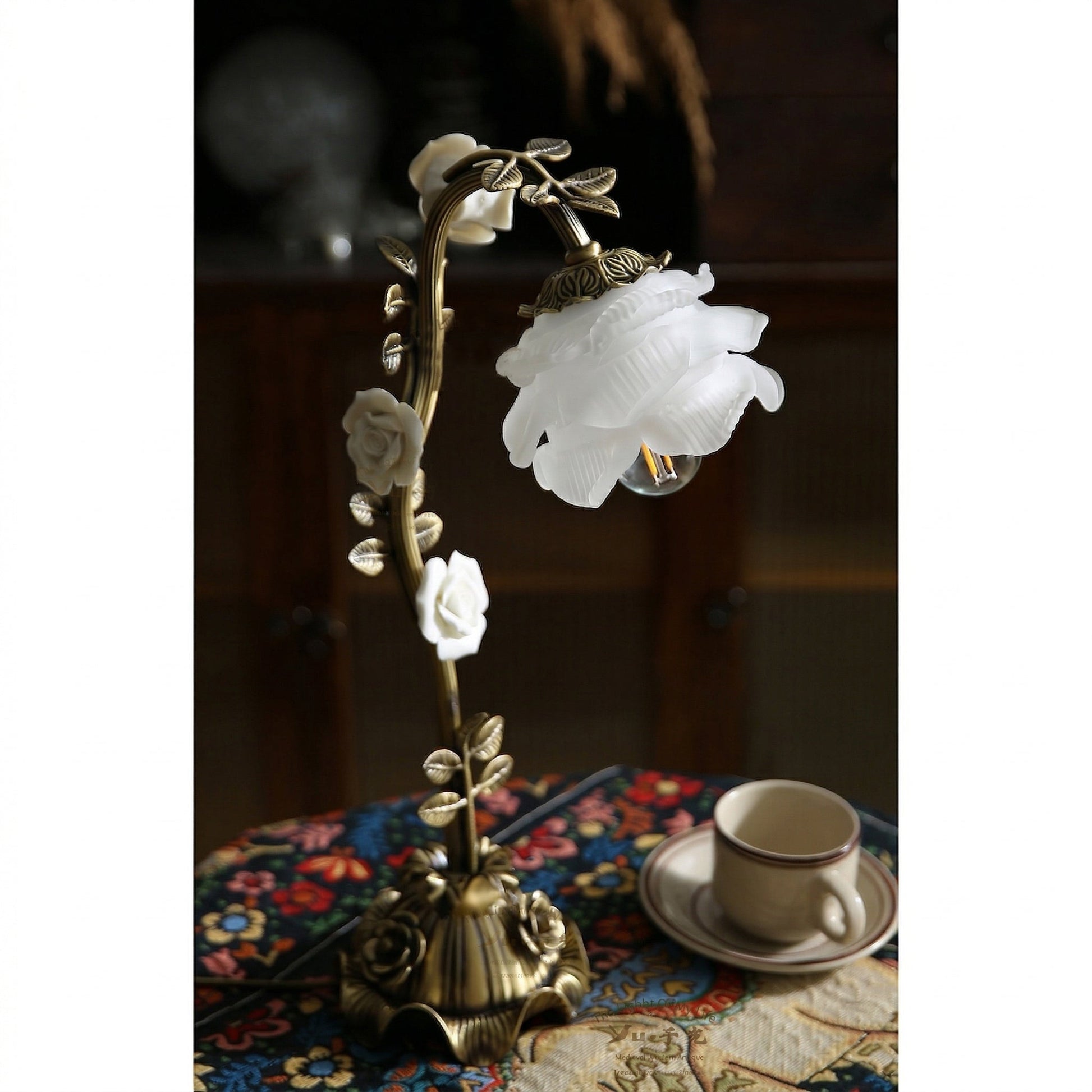 The Rosalie lamp against a dark background to emphasize its luminosity.